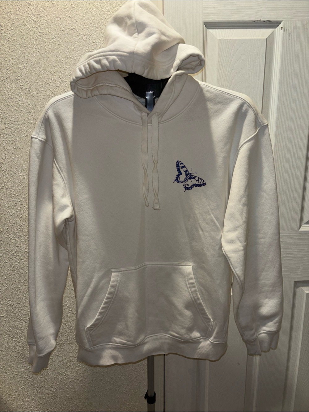 H&M Ivory Pullover Hoodie with Navy Butterfly Accent